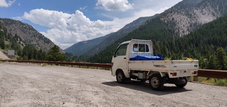 1996 Daihatsu Hijet with Wyoming mountains in background