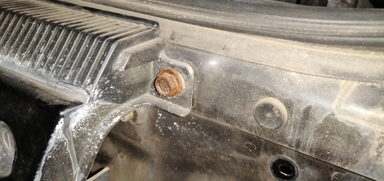 Rear center panel bolt shown