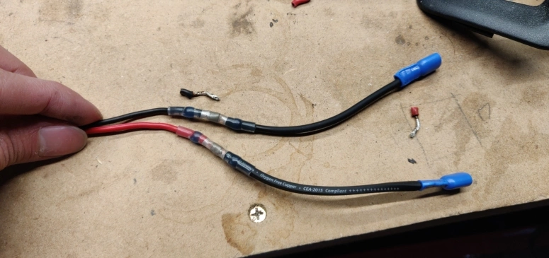 Rear speaker wire extended with spade connectors attached