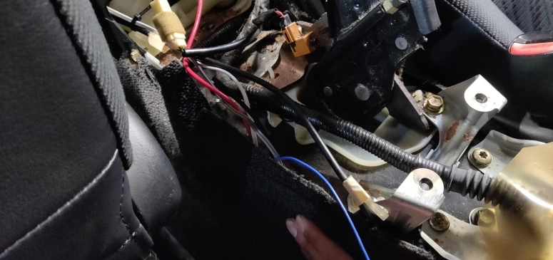 Kicker 46HS10 connection cable coming out of the driveshaft tunnel