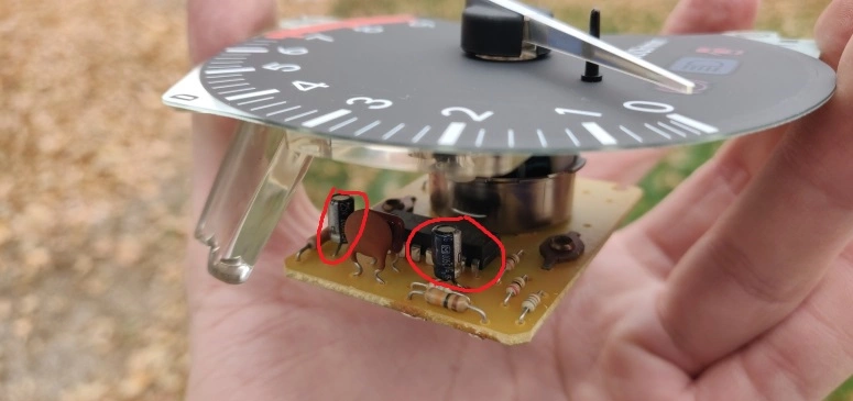 Tachometer with Capacitors Circled